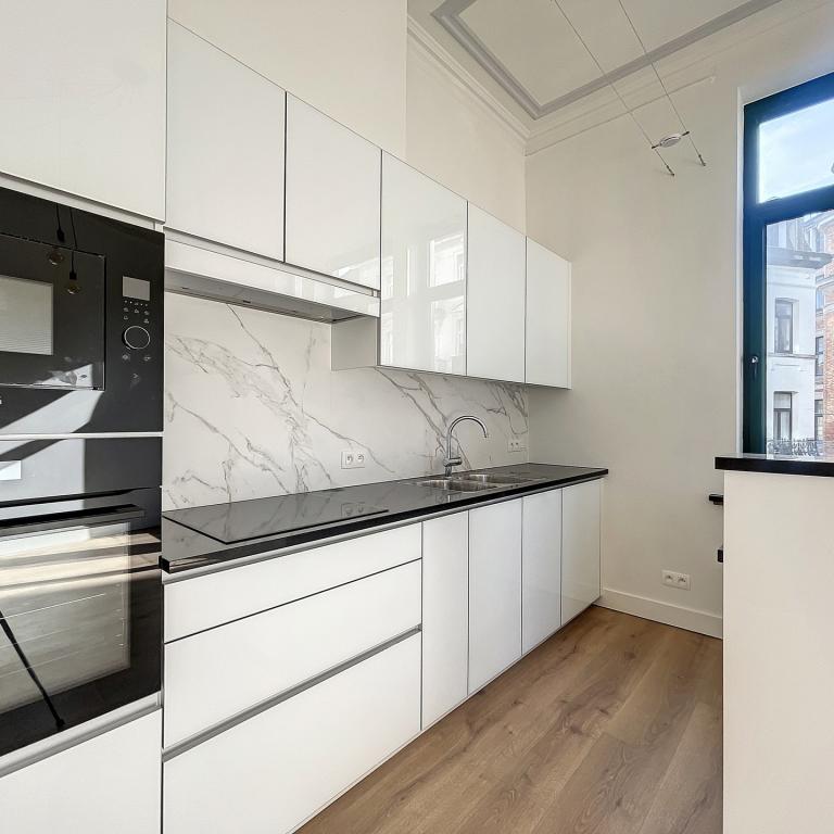 Sablon : Sublime appartement triplex penthouse remis à neuf