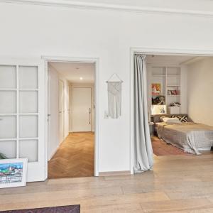 Châtelain/ Louise: bel appartement/ studio  + jardin commun