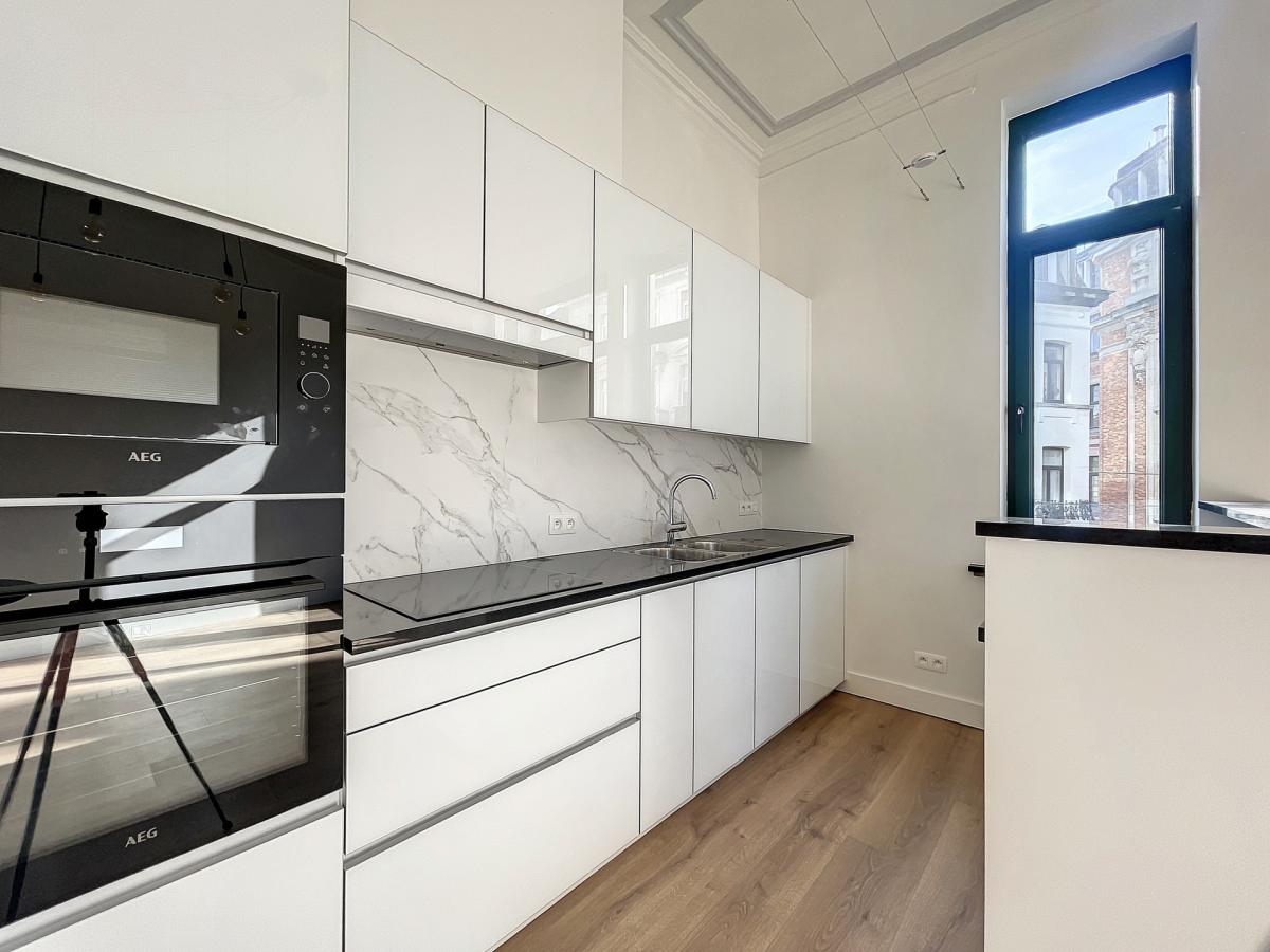 Sablon : Sublime appartement triplex penthouse remis à neuf